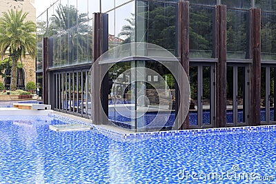 Water surrounds the glass house, adobe rgb Editorial Stock Photo