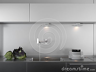 Water tap and dishes in a modern kitchen Stock Photo