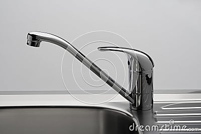 Water tap and sink in grey Stock Photo