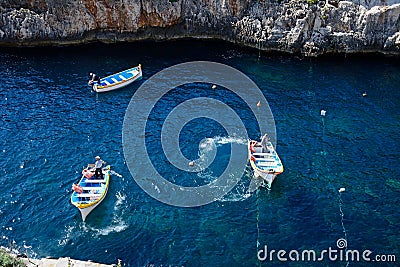 Water taxi boats in the bay, Glue Grotto. Editorial Stock Photo