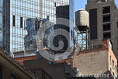 Water towers on the roofs of a buildings Editorial Stock Photo
