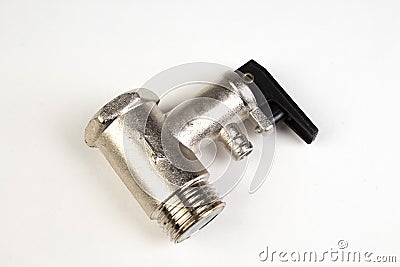 water valves, used inboiler water systems. Shiny metal, shiny texture on white background. Bathroom. Top view Stock Photo