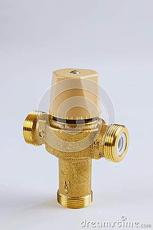 Water various supply plumbing brass thermostatic mixing valve isolated on white background Stock Photo