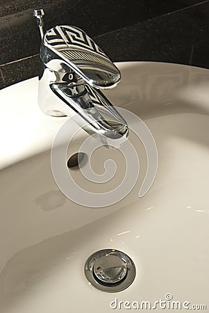 Water wash basin spout Stock Photo