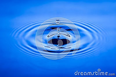 Water waves caused by falling droplets Stock Photo