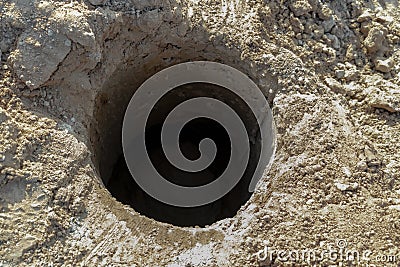 Water Well Drilling, Dig a well for water, Inside The Well. Deep well in the ground close-up Stock Photo