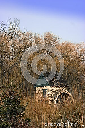 Water wheel in park Stock Photo
