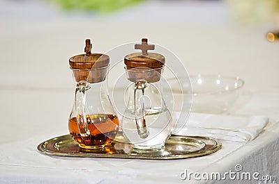 Water and wine on the altar ready for mass Stock Photo