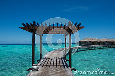 Water wooden bungalos at the topical resort at Maldives Stock Photo