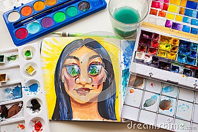 Watercolor girl with spiritual magic eyes, paints Stock Photo
