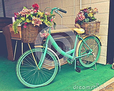 Watercolor Turquoise Bicycle With Beautiful Flower Basket vintage tone Stock Photo