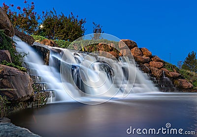 Waterfall at Regatta Park in Oklahoma City at Dusk Stock Photo