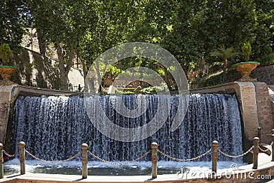 Waterfall of Ain Asserdoun from where water gushes from the freshwater spring and is the source of the city of Beni Mellal. Stock Photo