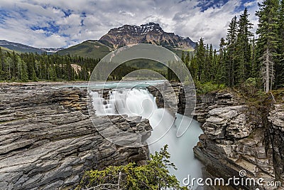 Waterfall in the Canadian Rocky Mountains- Jasper National Park Stock Photo