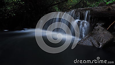 Waterfall at the carpatian mountains green forest Stock Photo