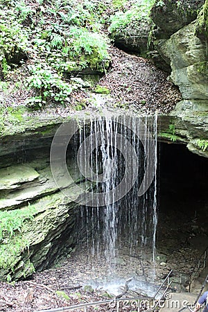 Waterfall at Cave Entrance Stock Photo