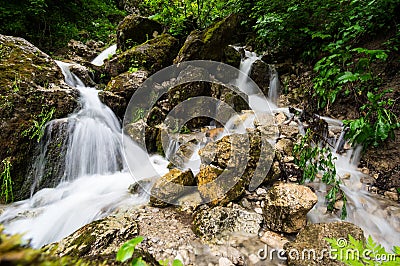 Waterfall in Cherek gorge in the Caucasus mountains in Russia Stock Photo