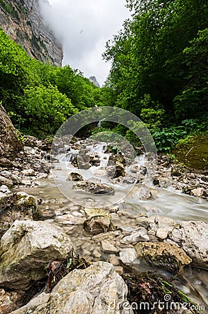 Waterfall in Cherek gorge in the Caucasus mountains in Russia Stock Photo