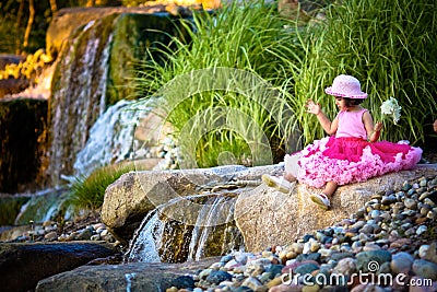 Waterfall and a child Stock Photo