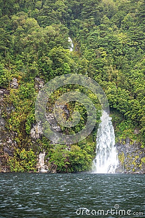 waterfall at Doubtful Sound Fiordland National Park New Zealand Stock Photo