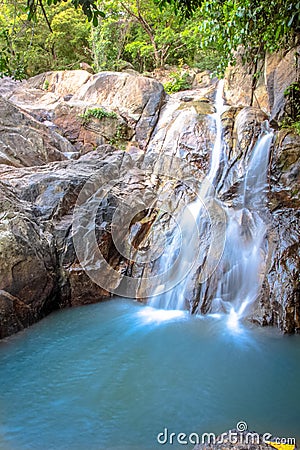 Waterfall in forest Stock Photo