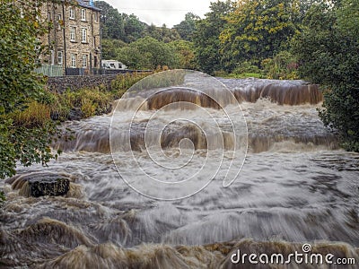 Waterfall on Gayle Beck, Gayle Village, high water Stock Photo