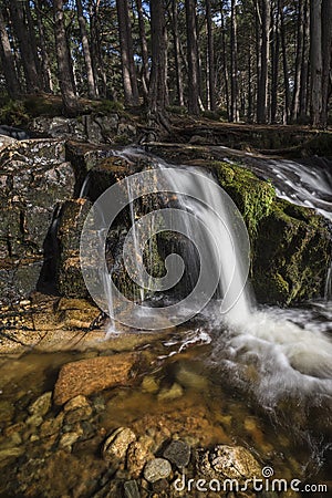 Waterfall at Glen Feshie in the highlands of Scotland. Stock Photo