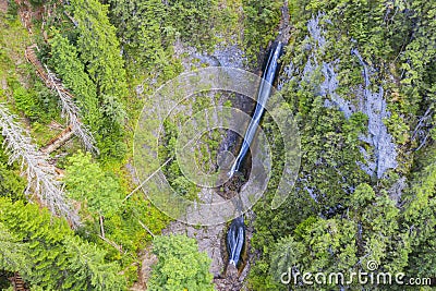 Waterfall in green canyon Stock Photo