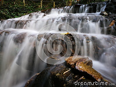 Waterfall mossy rocks Stock Photo