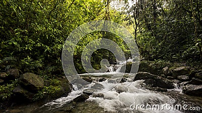 A waterfall, mountain river in ChocÃ³ Rainforest, Colombia Stock Photo