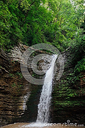 a waterfall nature travel hiking green forest Stock Photo