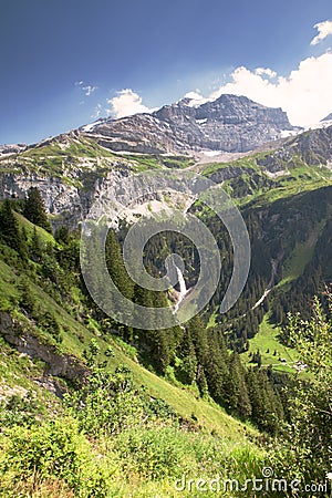 Waterfall near Klausen Pass in Swiss Alps Stock Photo