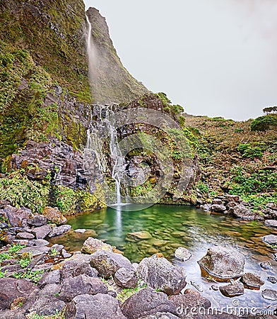 Waterfall Poco do Bacalhau at the Azores island of Flores Stock Photo