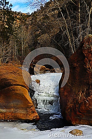 Waterfall through rocks Stock Photo