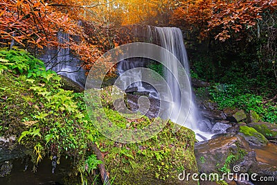 Waterfall scene at Rom Klao Pharadon Waterfalls in rainforest Thailand Stock Photo