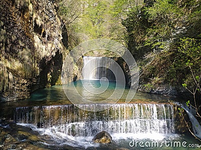 Waterfall secret Place Hide forest spring beautiful awesome travel secret working Stock Photo