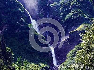 Waterfall Stauber or Wasserfall StÃ¤uber, Brunnibach stream in the Alpine Valley of Maderanertal Stock Photo