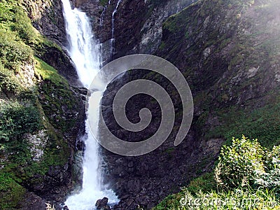 Waterfall Stauber or Wasserfall StÃ¤uber, Brunnibach stream in the Alpine Valley of Maderanertal Stock Photo