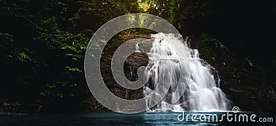 Waterfall in tropical forest around the wild jungle, Asia, Thailand Stock Photo