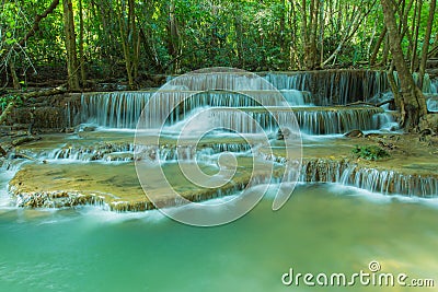 Waterfall in tropical forest at National park Kanchanaburi province Stock Photo