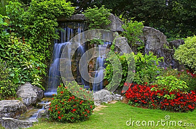 Waterfall in tropical garden Stock Photo