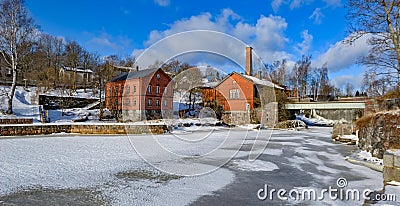 Waterfall in Vanhankaupunginkoski and old power station, Helsinki Stock Photo