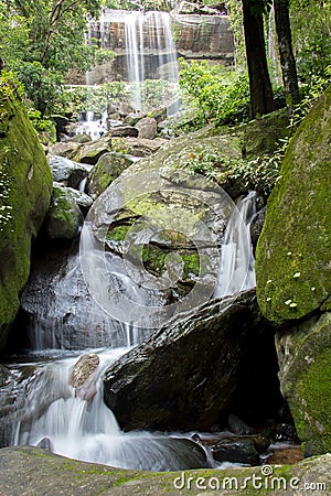 Waterfalls, clear, beautiful, green, plants, moss, rocks. Stock Photo