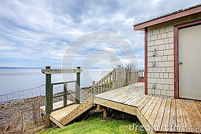 Waterfront beach boat house storage shed. Stock Photo