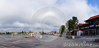 The waterfront boardwalk in Mikolajki on Lake Sniardwy Editorial Stock Photo