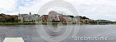 Waterfront of historic Downtown along the Kennebec River, Augusta, ME, USA Stock Photo