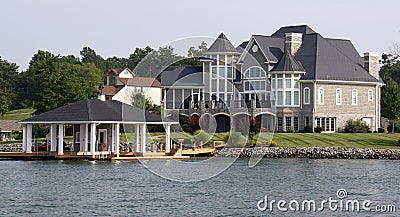 Waterfront Home with Boathouse Stock Photo