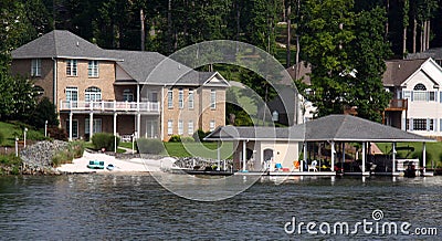 Waterfront Houses with Boathouse Stock Photo