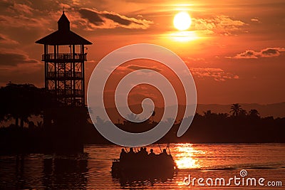 Waterfront Kuching with Silhouette Boat Stock Photo