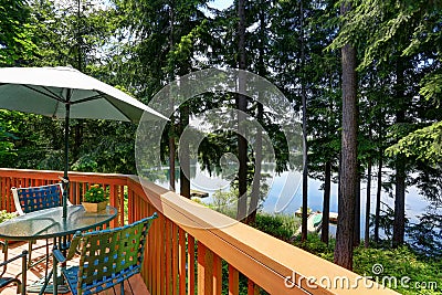 Waterfront lake with small pier. View from balcony. Stock Photo